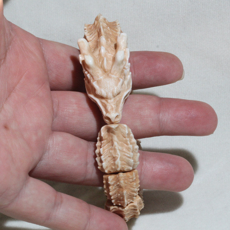 Antiqued Carved Antler Dragon Biting Its Own Tail Bracelet