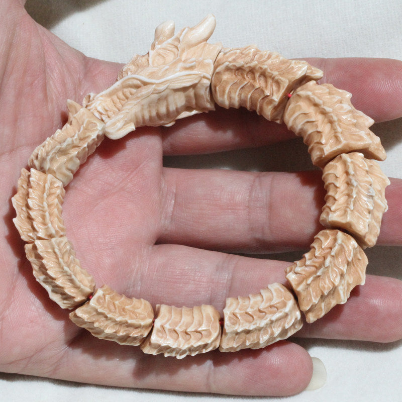 Antiqued Carved Antler Dragon Biting Its Own Tail Bracelet