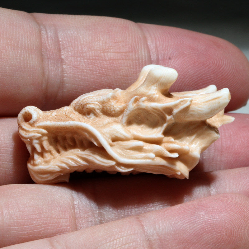 Antiqued Carved Antler Dragon Biting Its Own Tail Bracelet