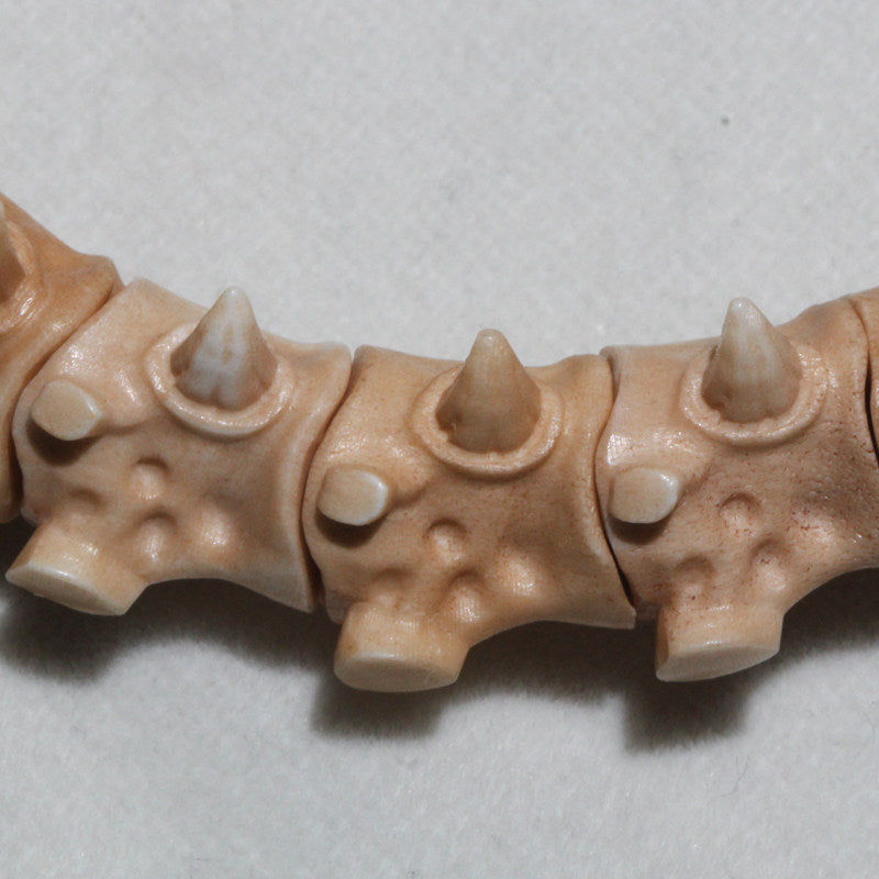 Antiqued Carved Antler Dragon Holding a Bead Bracelet