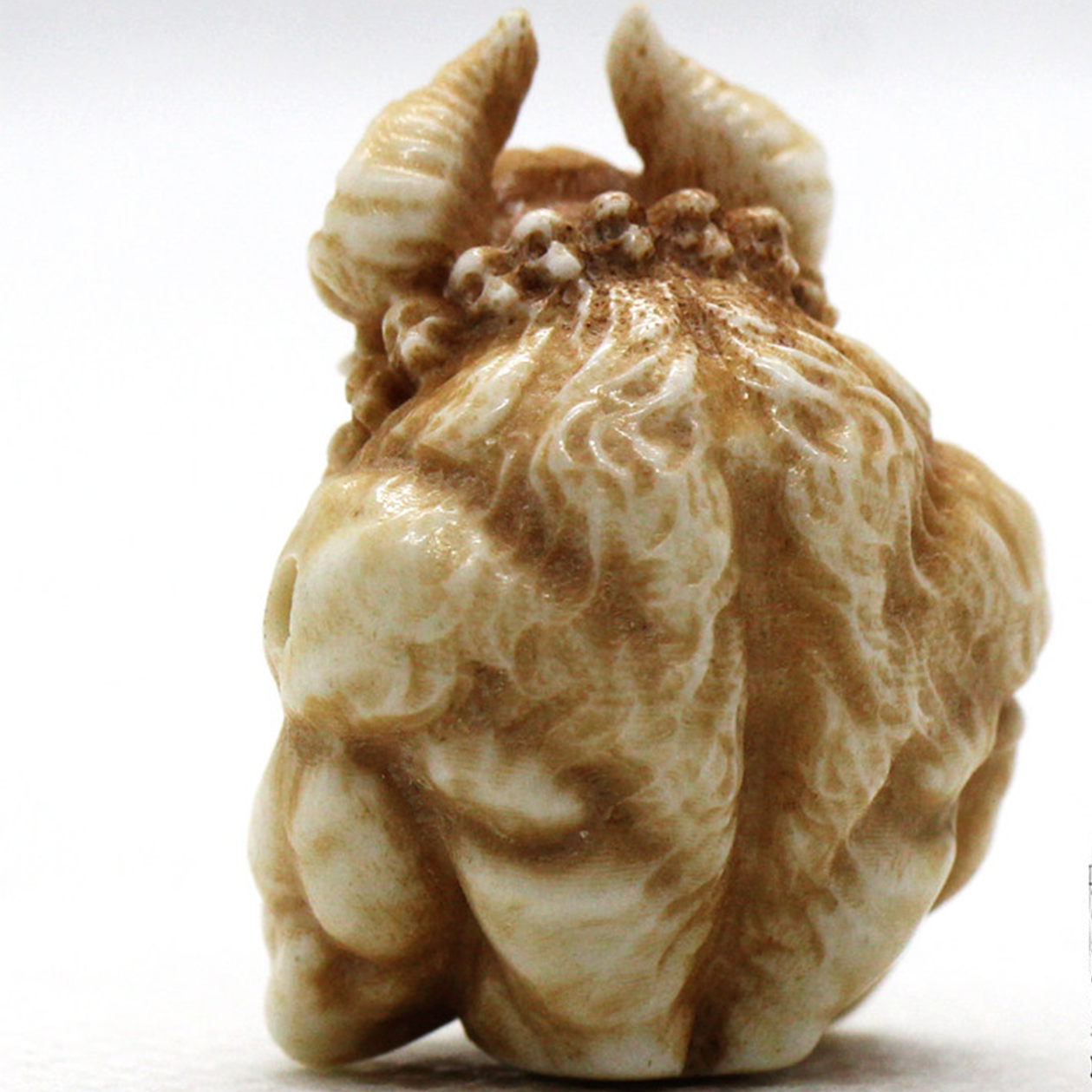 Antler-Carved Ox Demon Pendant