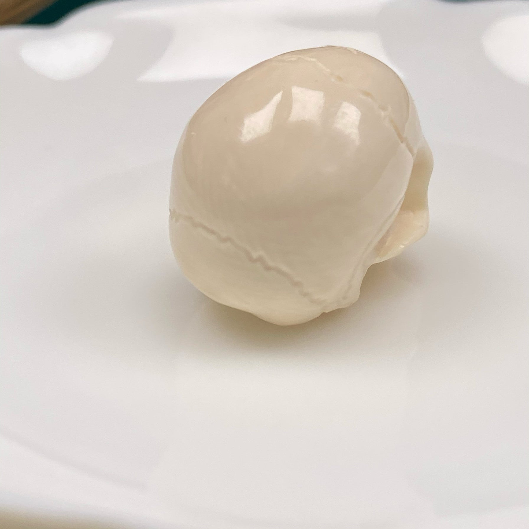 Carved Mammoth Ivory Half-Jaw Skull Bead