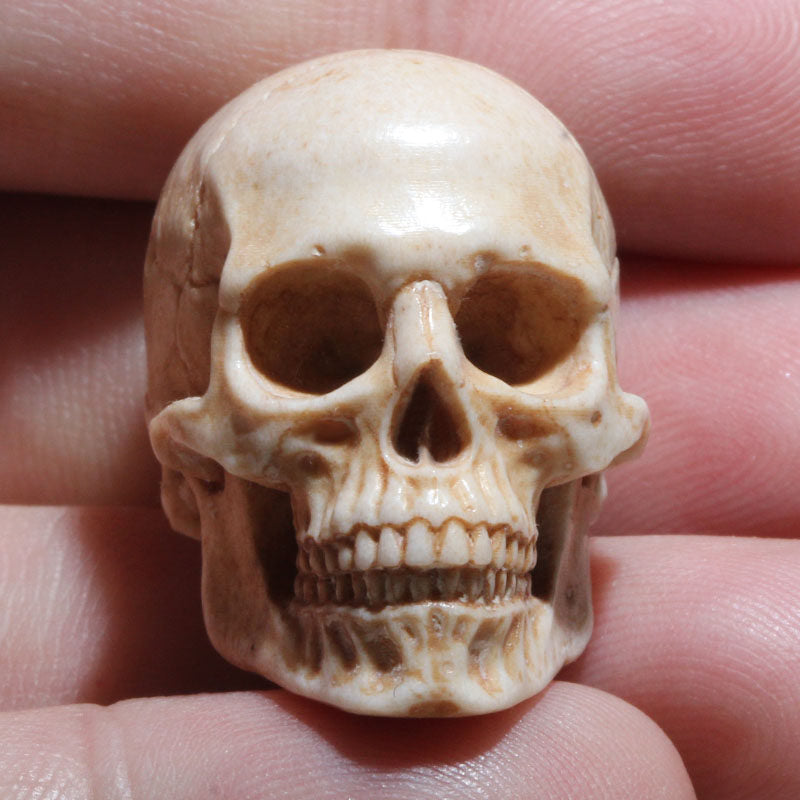 Hand-Carved Antler Human Skull Bead