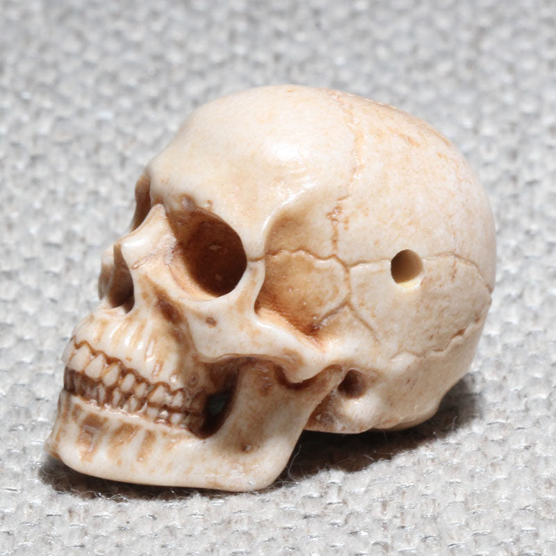 Hand-Carved Antler Human Skull Bead