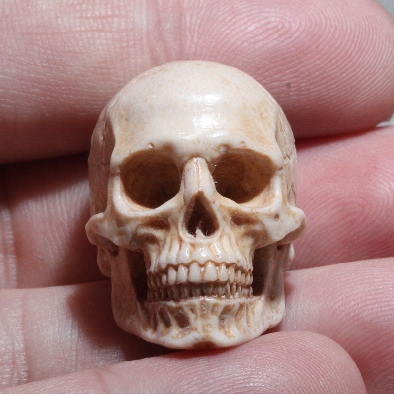 Hand-Carved Antler Human Skull Bead