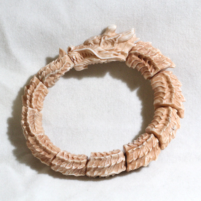 Antiqued Carved Antler Dragon Biting Its Own Tail Bracelet
