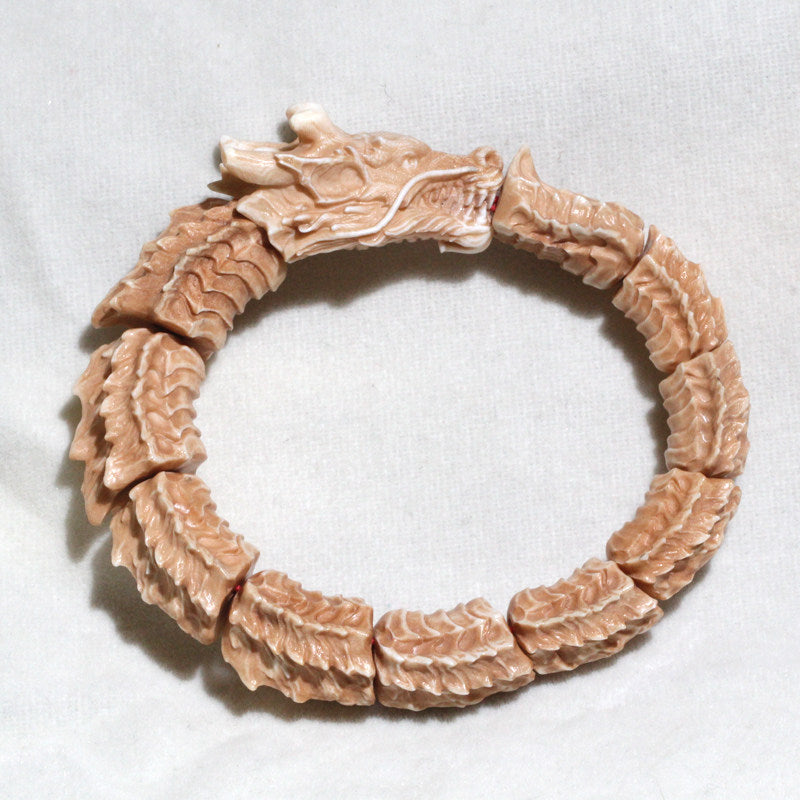 Antiqued Carved Antler Dragon Biting Its Own Tail Bracelet