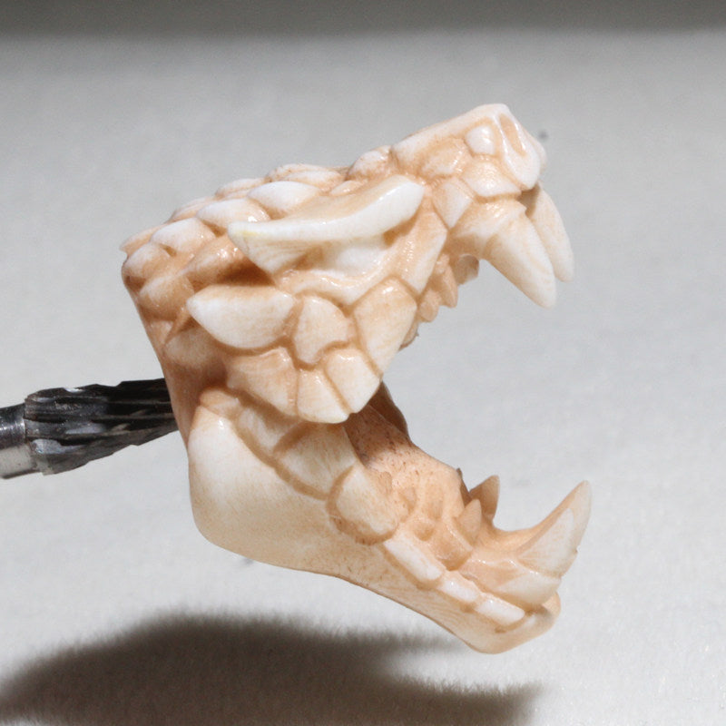 Antiqued Carved Antler Dragon Holding a Bead Bracelet
