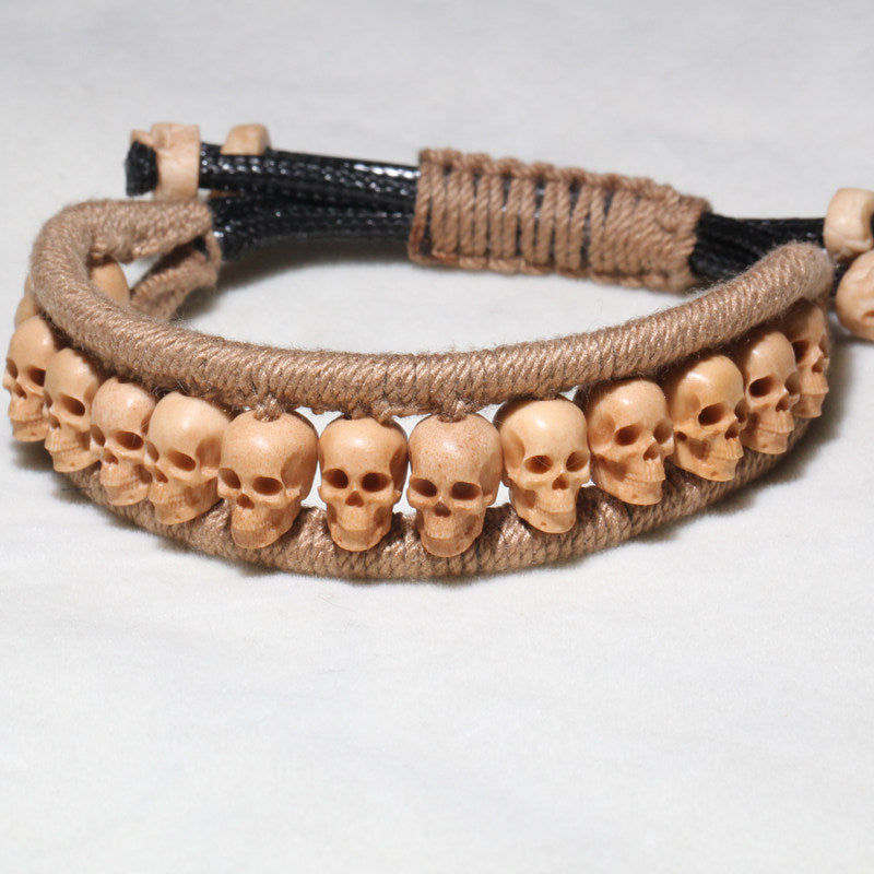 Antiqued Deer Antler Carved Skull Woven Bracelet