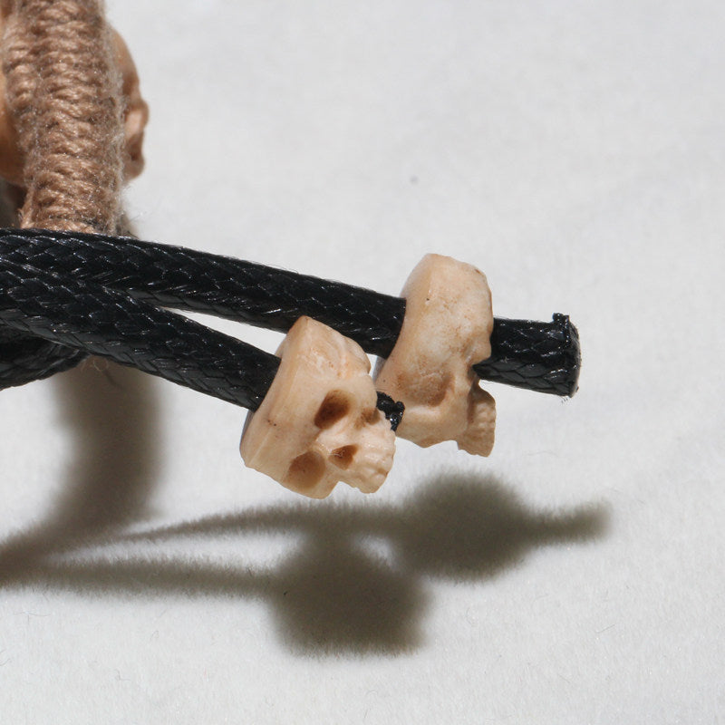 Antiqued Deer Antler Carved Skull Woven Bracelet