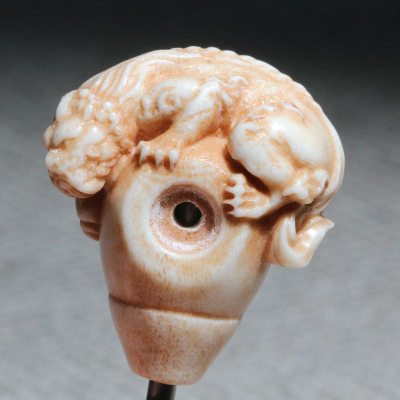 Antler-Carved Crouching Monster Pendant