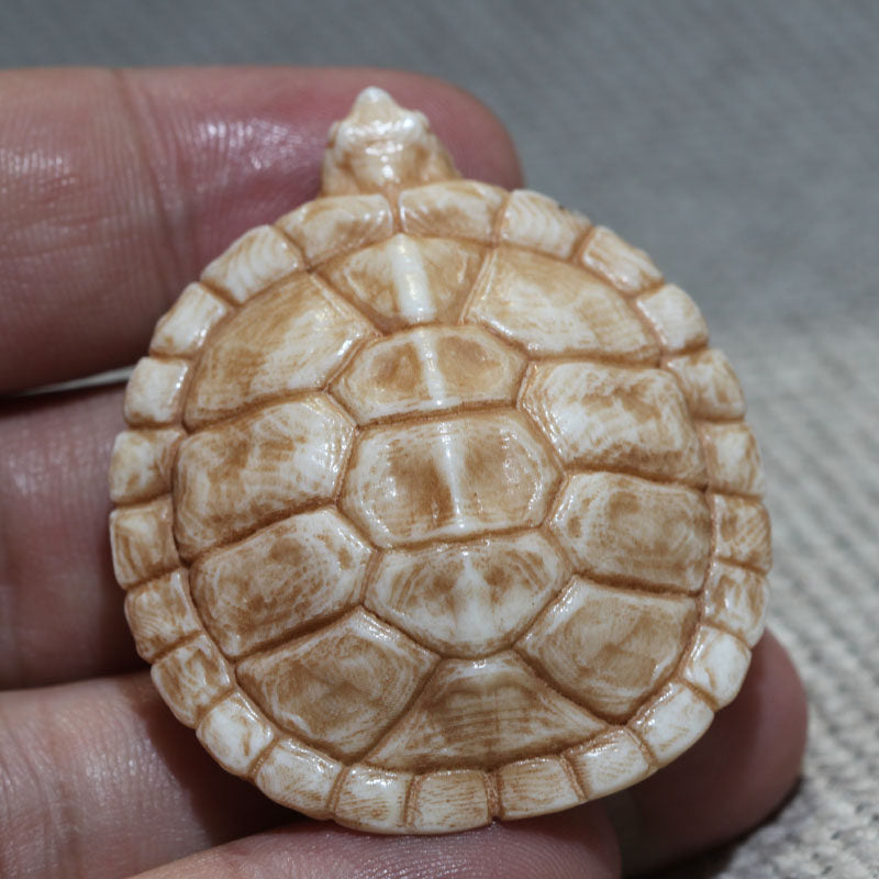 Antler-Carved Turtle Shell Pendant