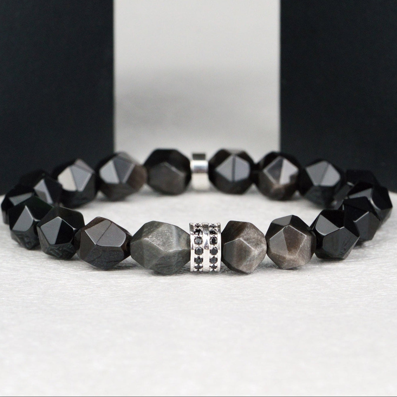 Bracelet géométrique à facettes noir et gris
