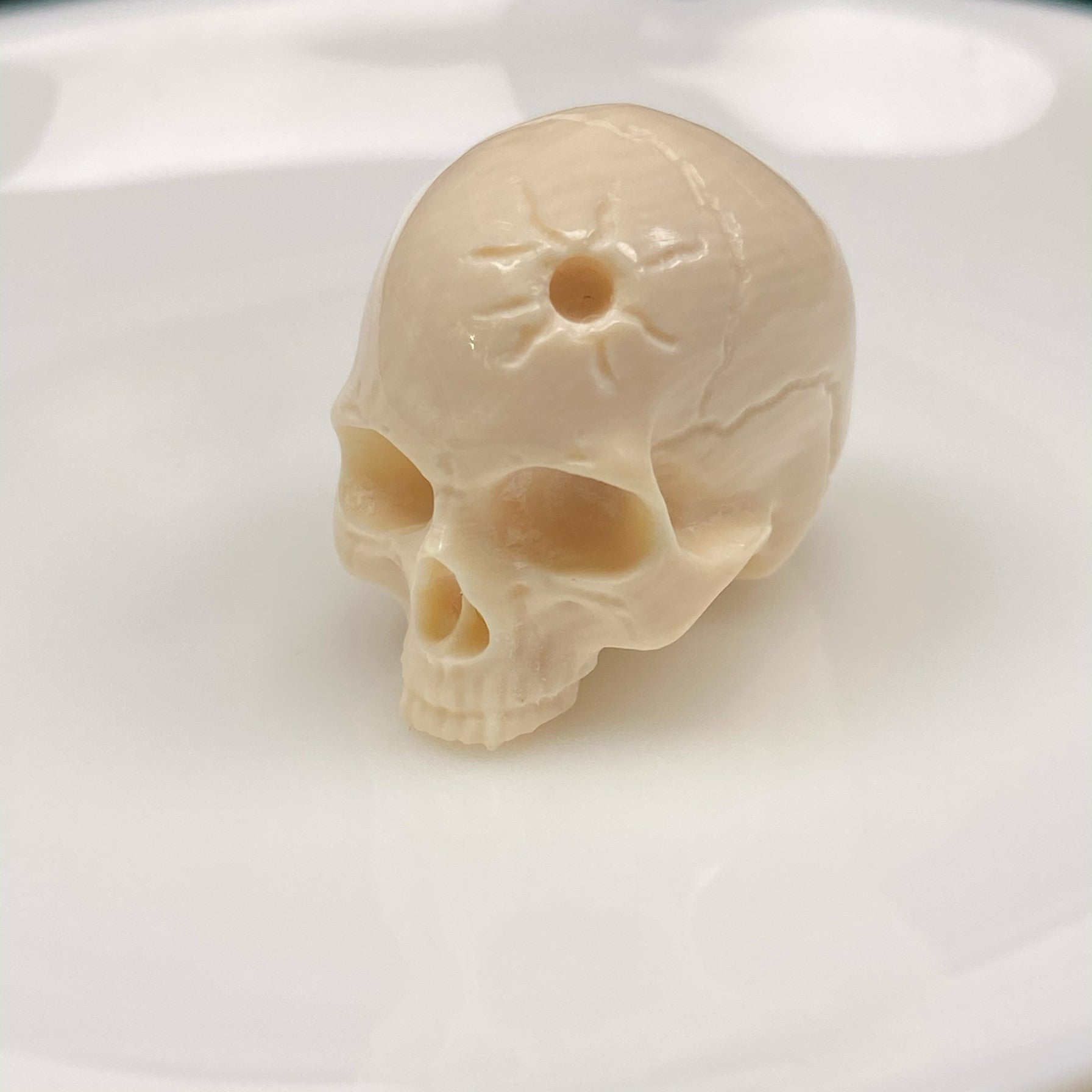 Carved Mammoth Ivory Half-Jaw Skull Bead