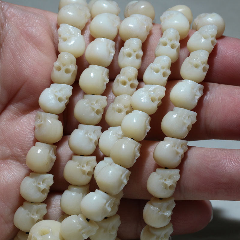 Carved Ox Bone Skull Bead Bracelet