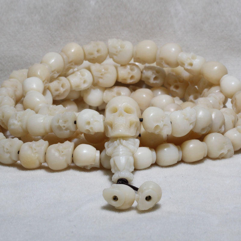 Carved Ox Bone Skull Bead Necklace