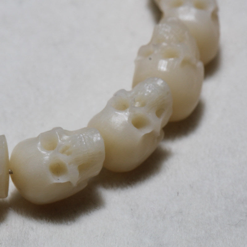 Carved Ox Bone Skull Bead Necklace