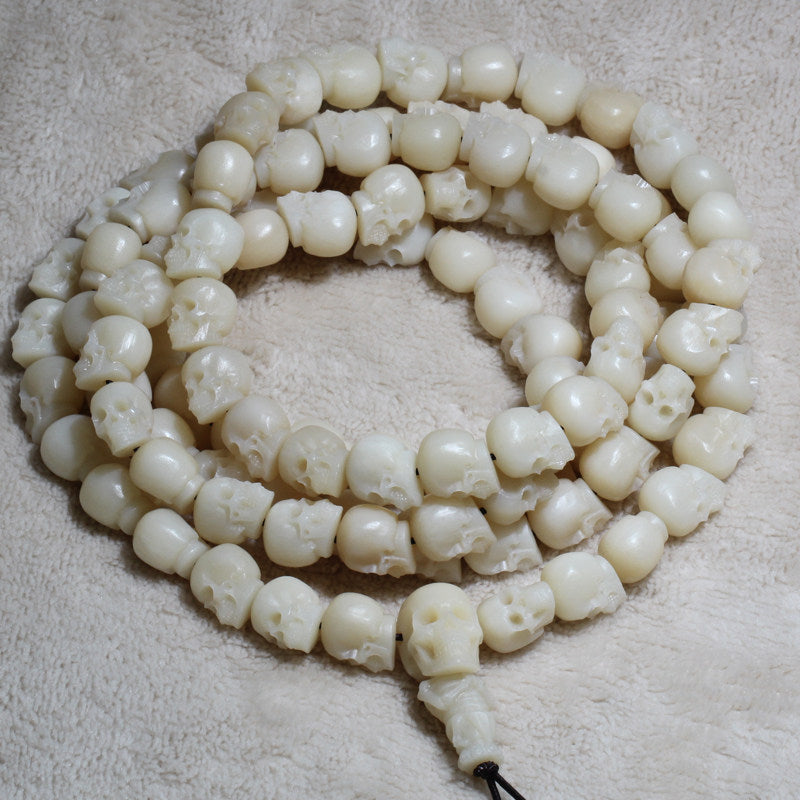 Carved Ox Bone Skull Bead Necklace
