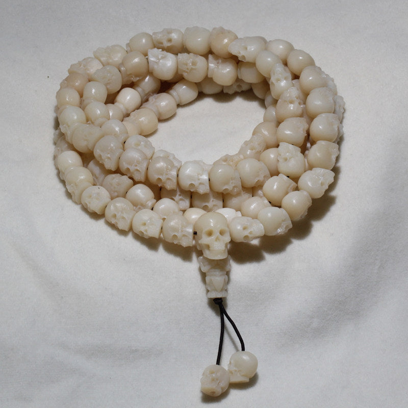 Carved Ox Bone Skull Bead Necklace