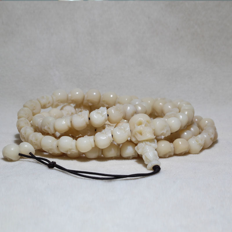 Carved Ox Bone Skull Bead Necklace