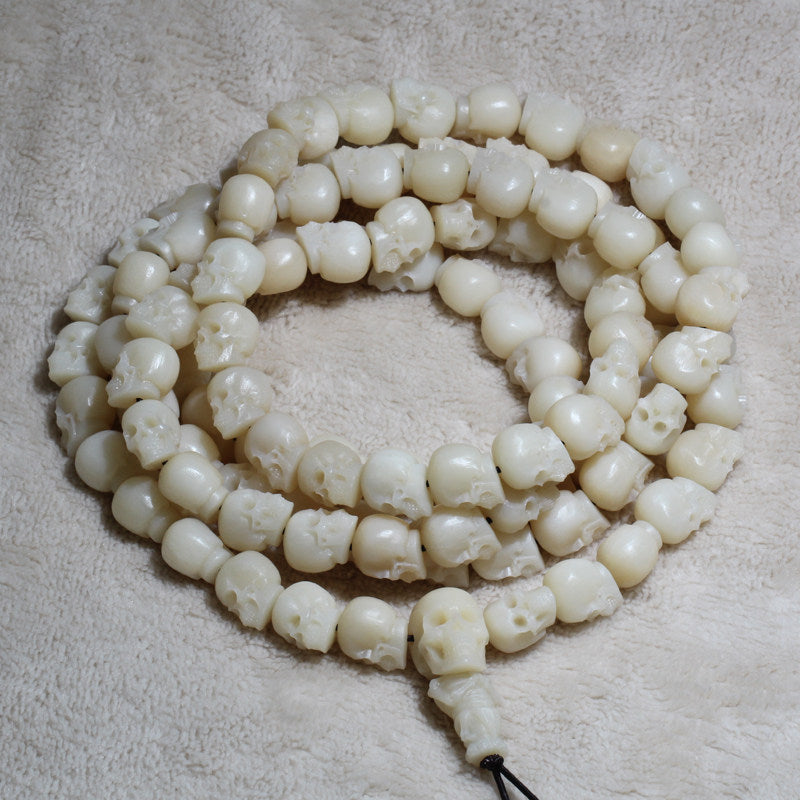 Carved Ox Bone Skull Bead Necklace
