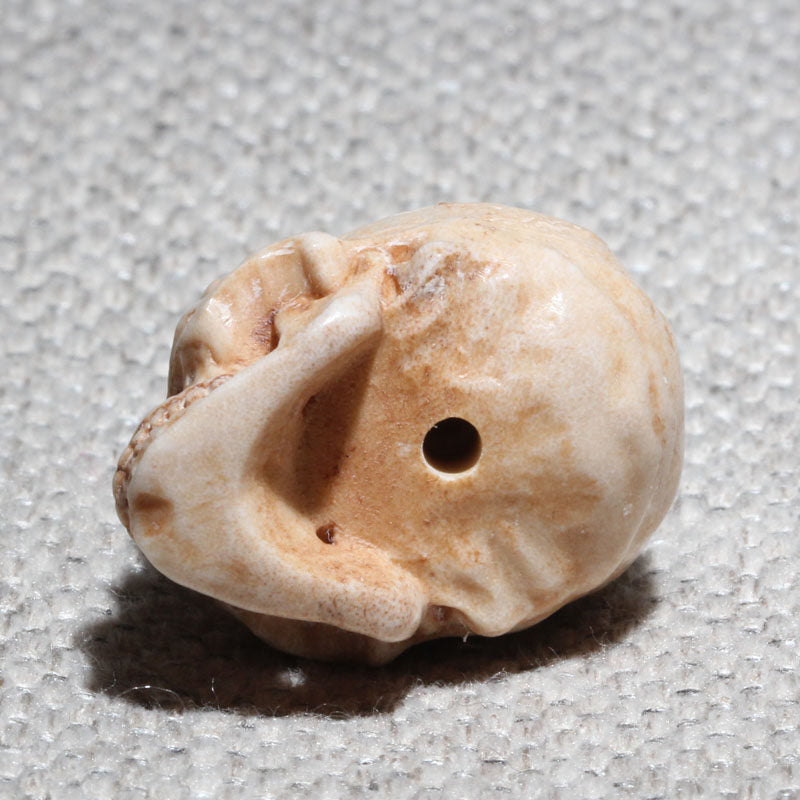 Hand-Carved Antler Human Skull Bead