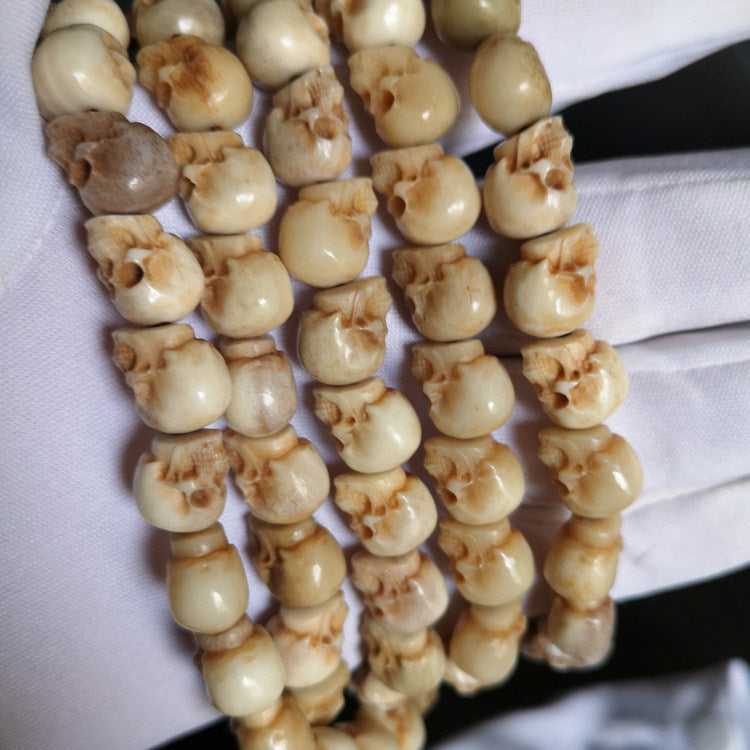 Antiqued Antler-Carved Skull Beaded Necklace